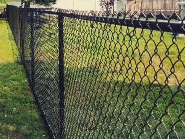 Heavy-duty industrial chain link fence by Fence Pro by Bruno
