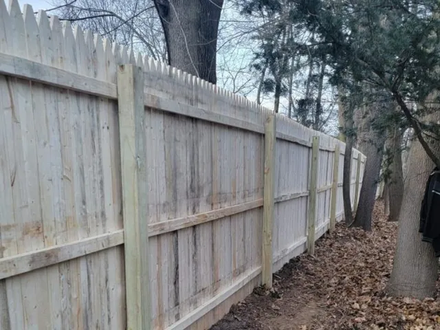 Pressure-treated pine wood fence by Fence Pro by Bruno