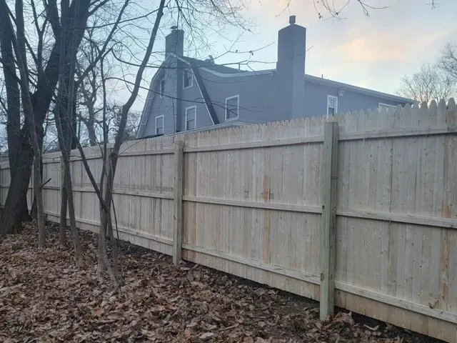 Pressure-treated pine wood fence sample